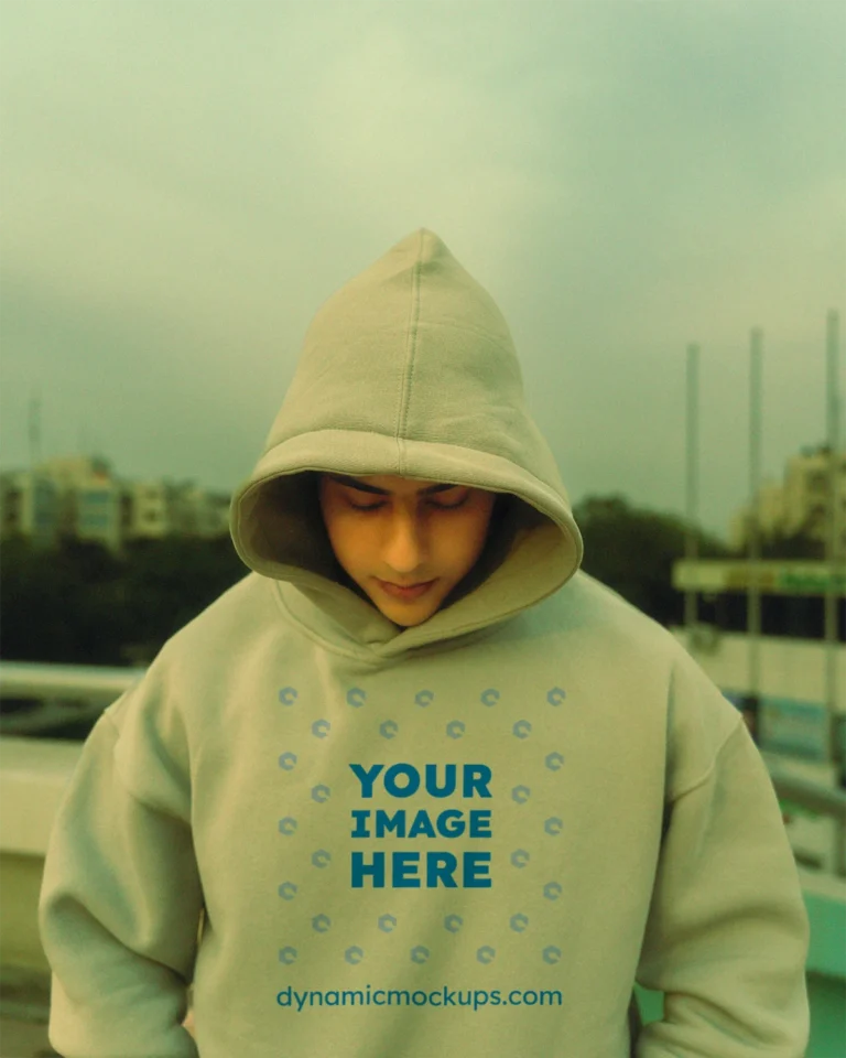 Man Wearing Cream Hoodie Mockup Front View Template