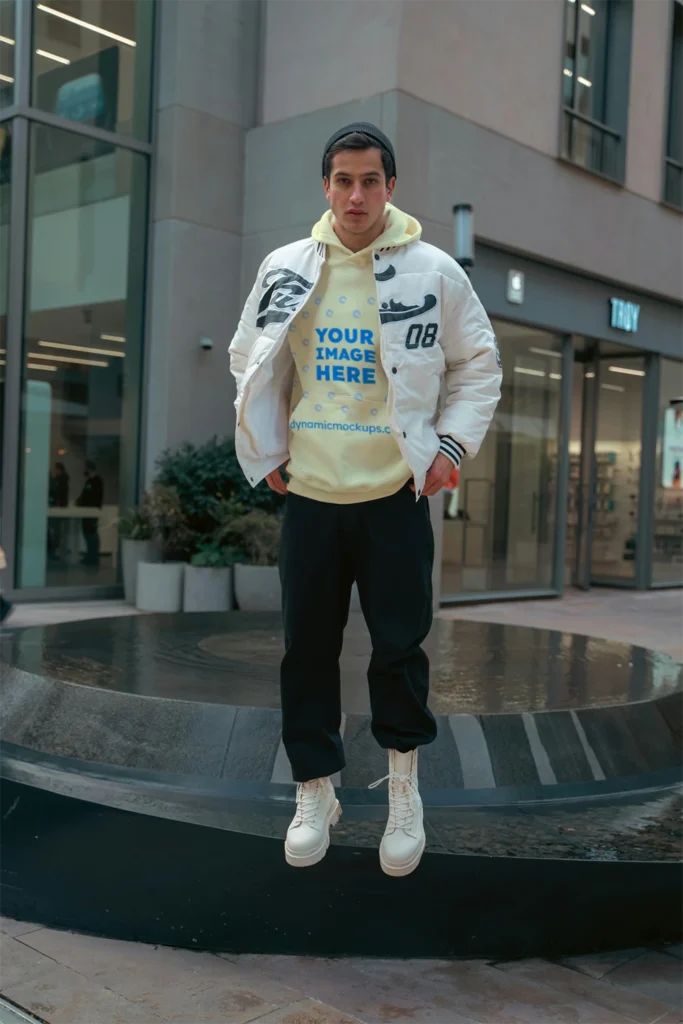 Man Wearing Cream Hoodie Mockup Front View Template