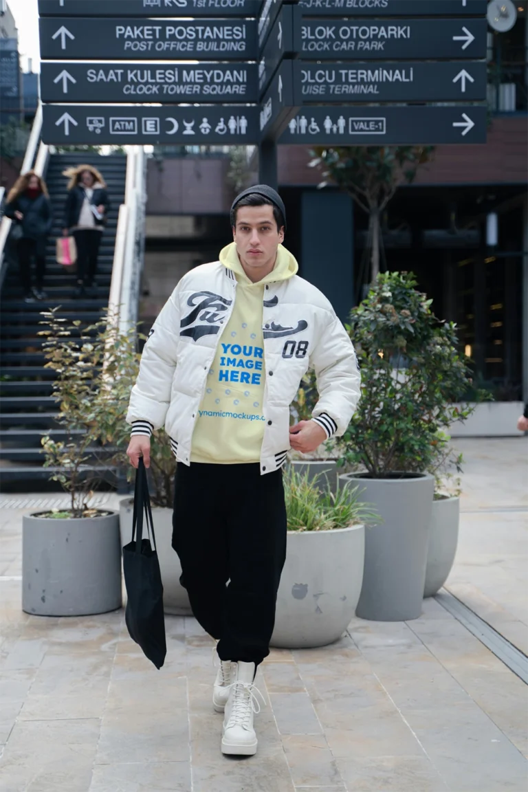 Man Wearing Cream Hoodie Mockup Front View Template