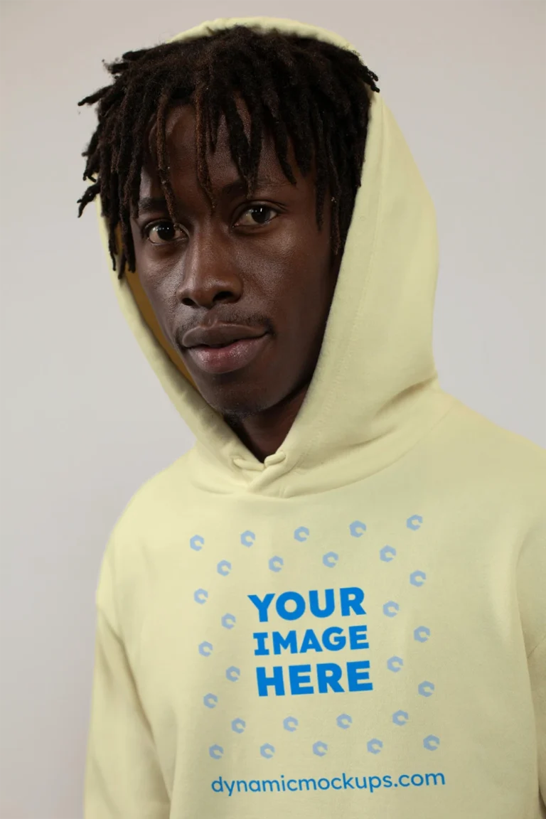 Man Wearing Cream Hoodie Mockup Front View Template