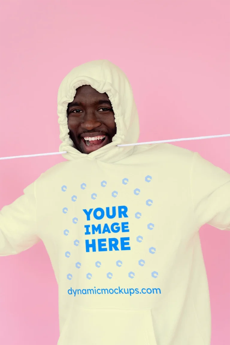 Man Wearing Cream Hoodie Mockup Front View Template