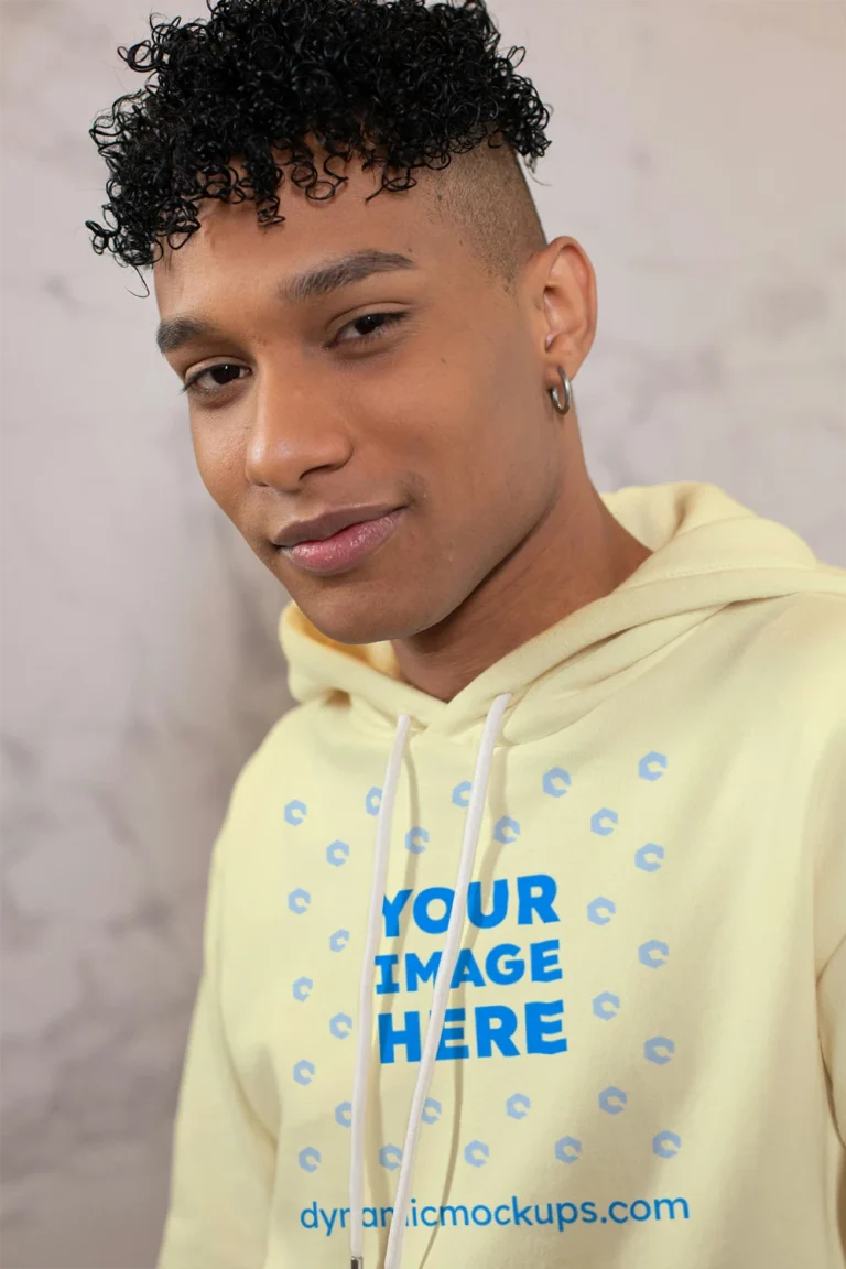 Man Wearing Cream Hoodie Mockup Front View Template