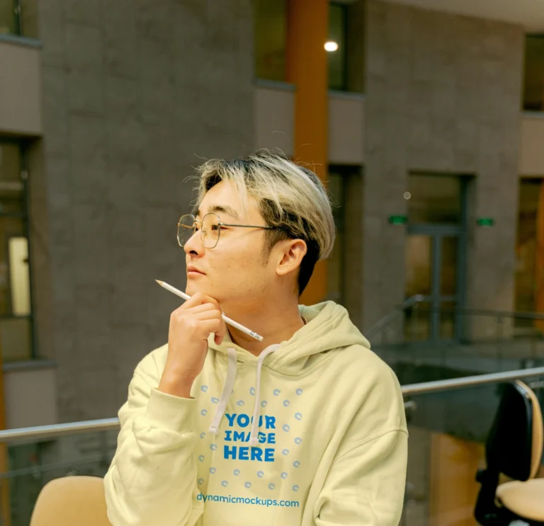 Man Wearing Cream Hoodie Mockup Front View Template