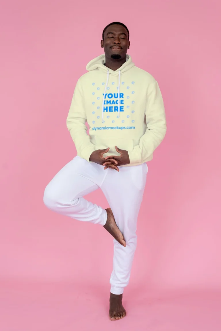 Man Wearing Cream Hoodie Mockup Front View Template