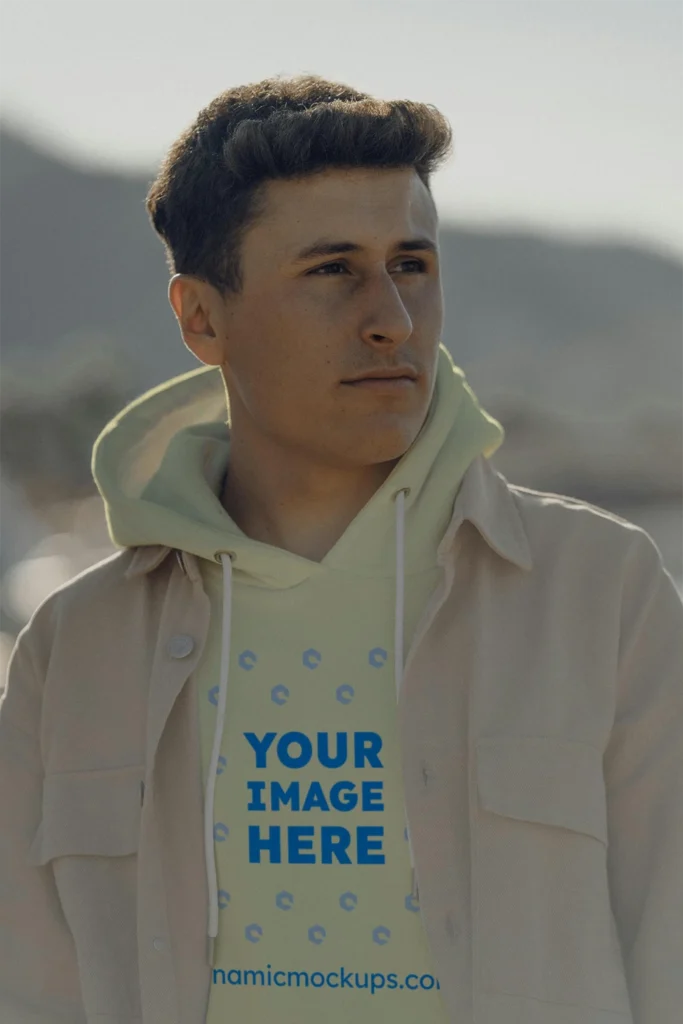 Man Wearing Cream Hoodie Mockup Front View Template
