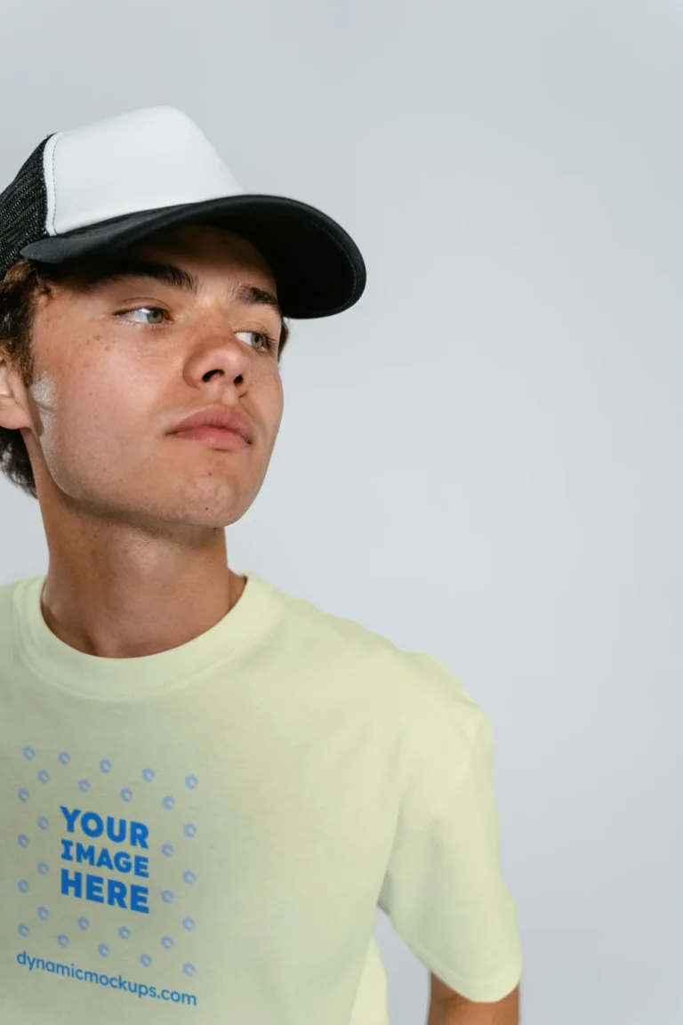 Man Wearing Cream T-shirt Mockup Front View Template