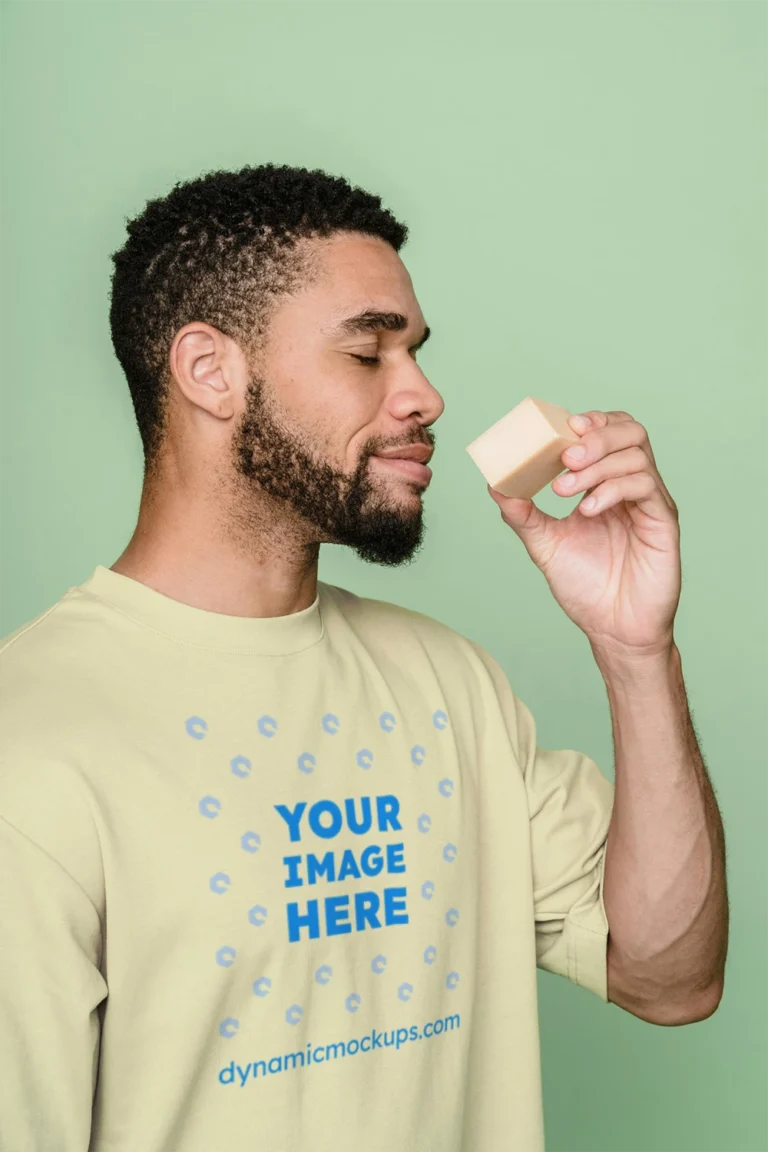 Man Wearing Cream T-shirt Mockup Front View Template