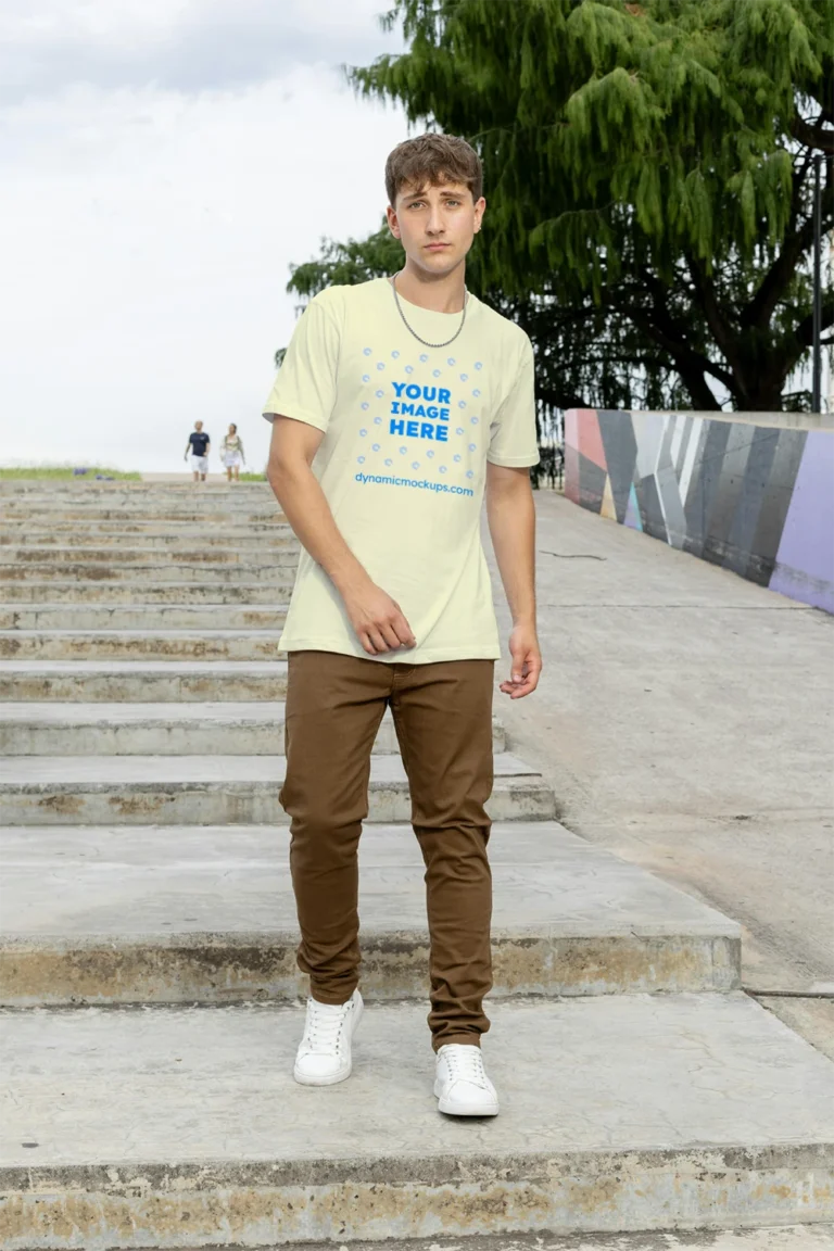 Man Wearing Cream T-shirt Mockup Front View Template