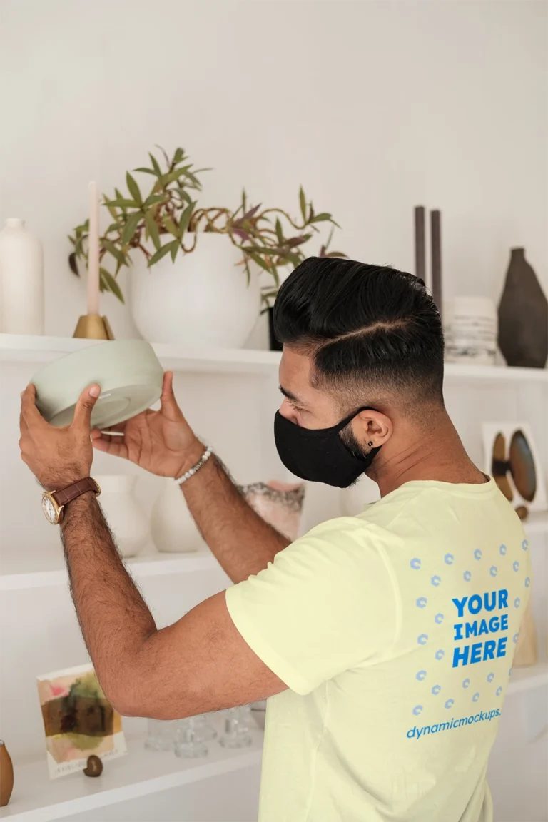 Man Wearing Cream T-shirt Mockup Back View Template