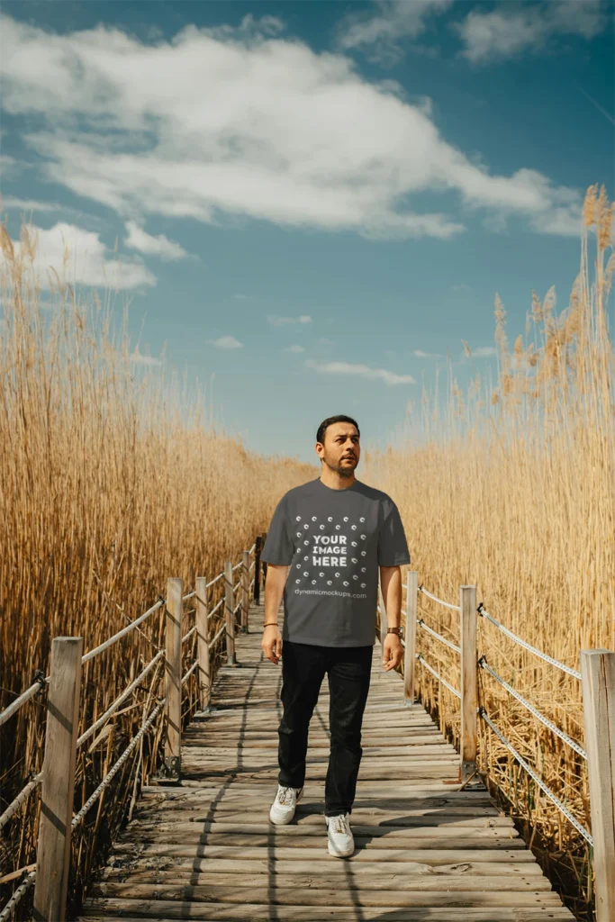 Man Wearing Dark Gray T-shirt Mockup Front View Template