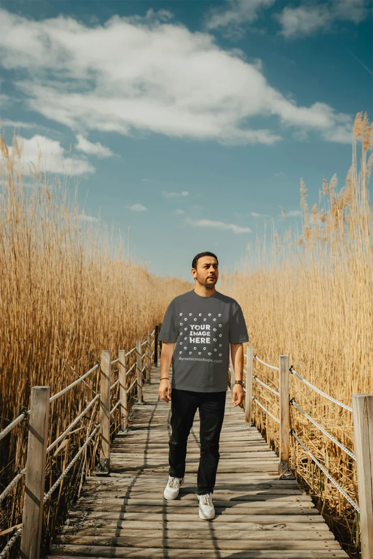 Man Wearing Dark Gray T-shirt Mockup Front View Template