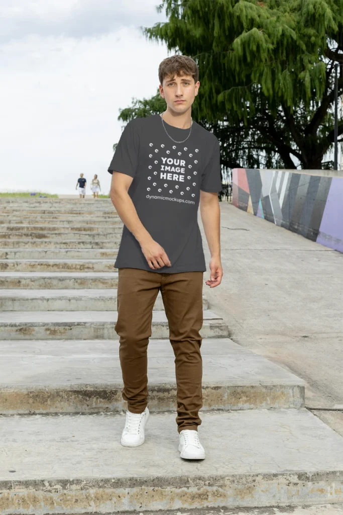 Man Wearing Dark Gray T-shirt Mockup Front View Template