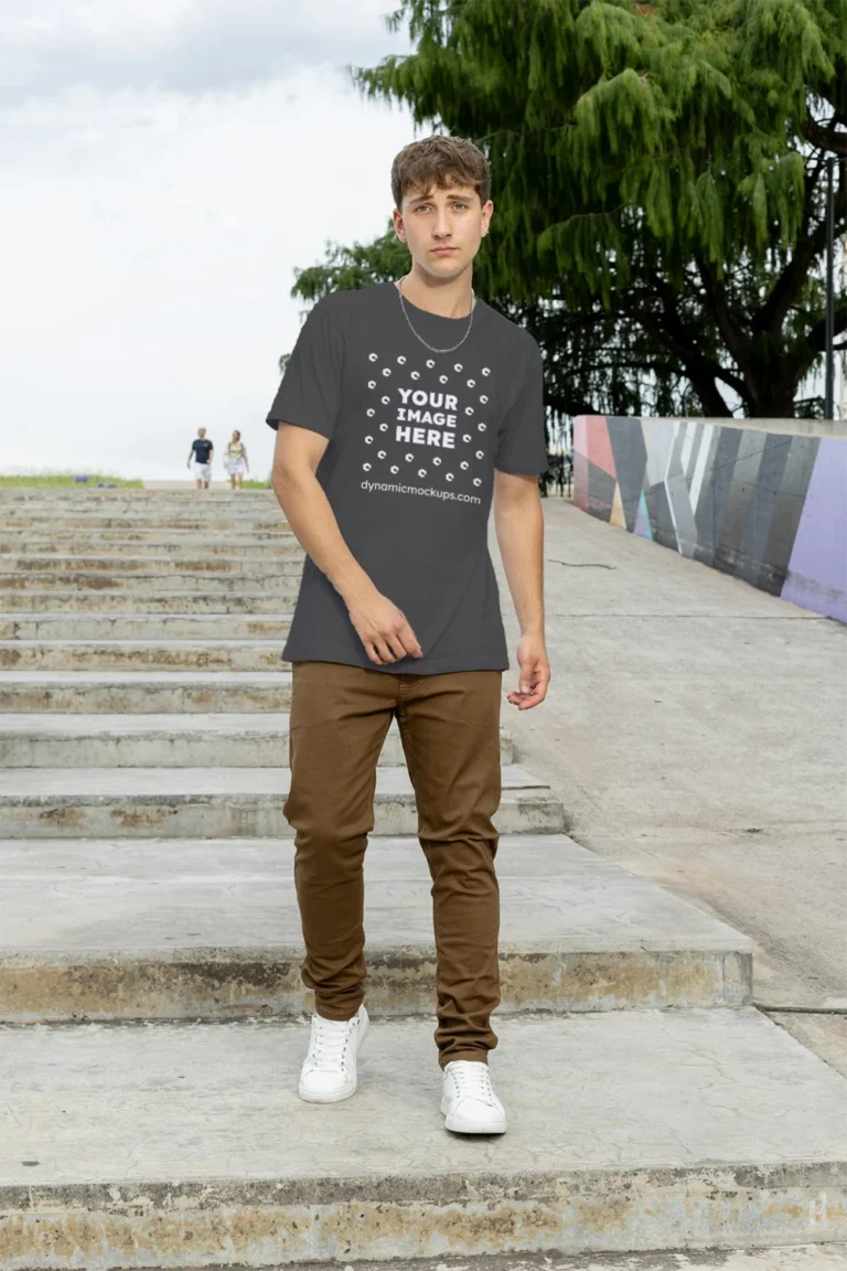 Man Wearing Dark Gray T-shirt Mockup Front View Template