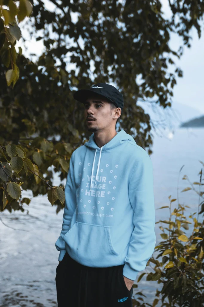 Man Wearing Light Blue Hoodie Mockup Front View Template