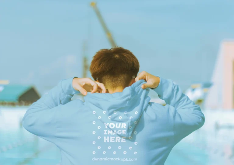 Man Wearing Light Blue Hoodie Mockup Back View Template