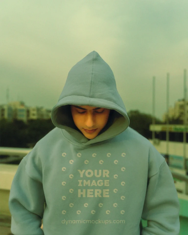 Man Wearing Light Blue Hoodie Mockup Front View Template