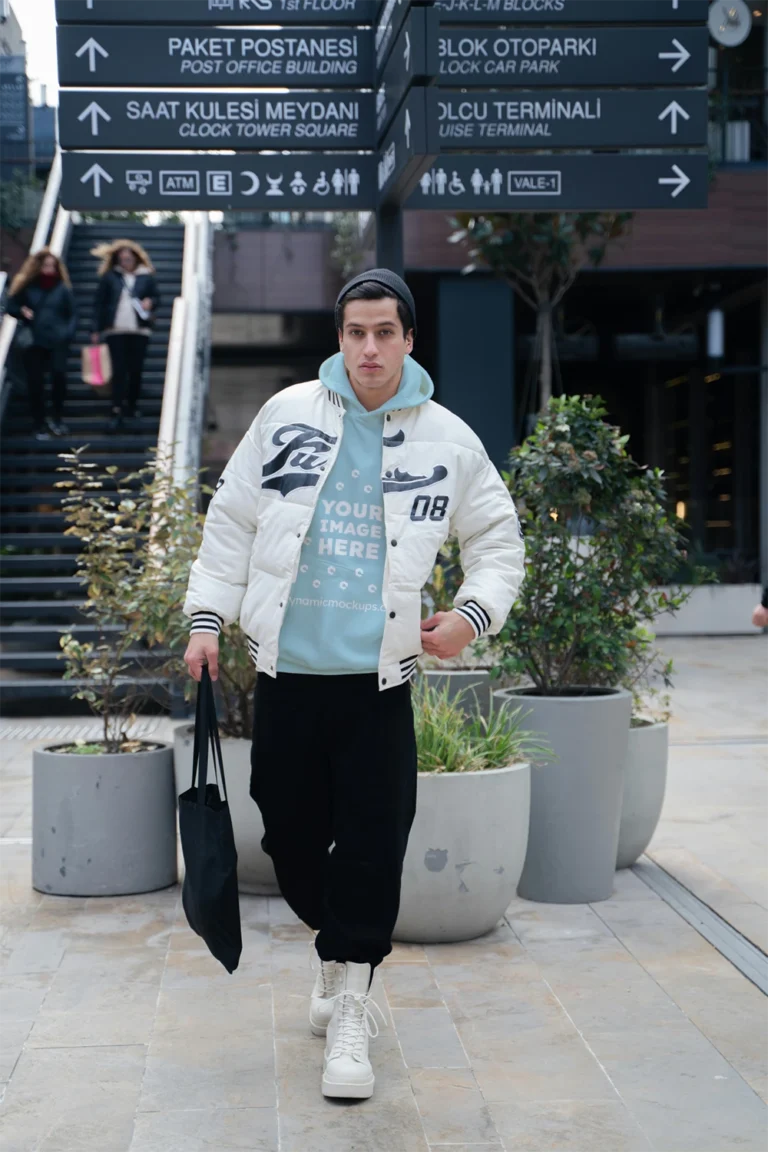 Man Wearing Light Blue Hoodie Mockup Front View Template
