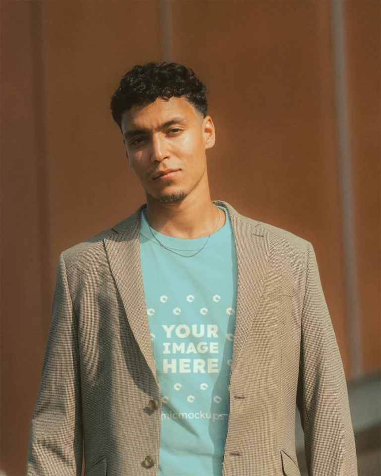 Man Wearing Light Blue T-shirt Mockup Front View Template