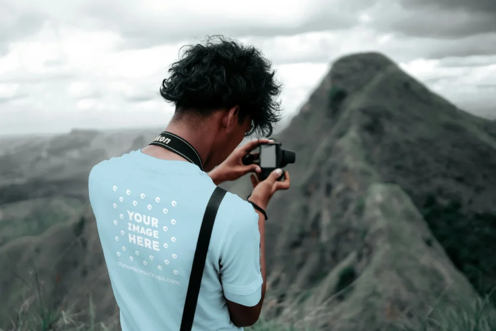 Man Wearing Light Blue T-shirt Mockup Back View Template