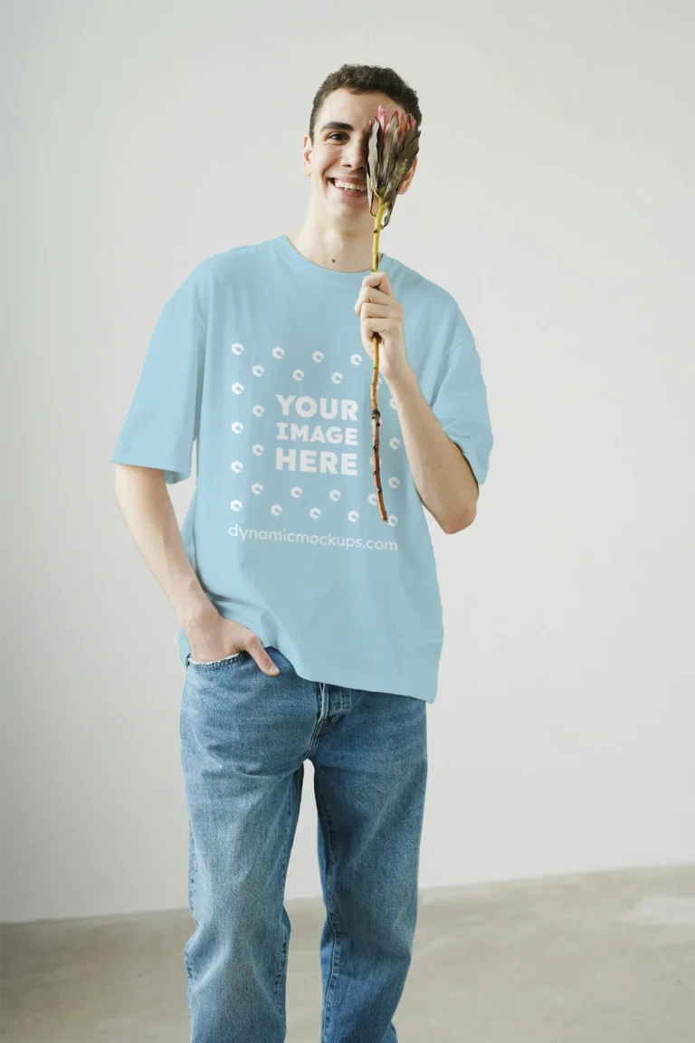 Man Wearing Light Blue T-shirt Mockup Front View Template