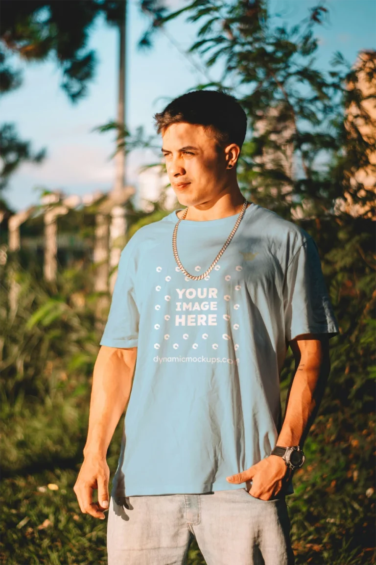 Man Wearing Light Blue T-shirt Mockup Front View Template