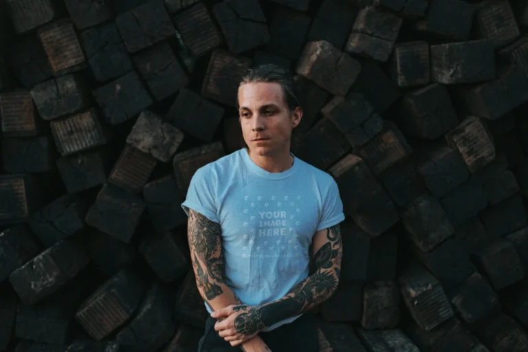 Man Wearing Light Blue T-shirt Mockup Front View Template