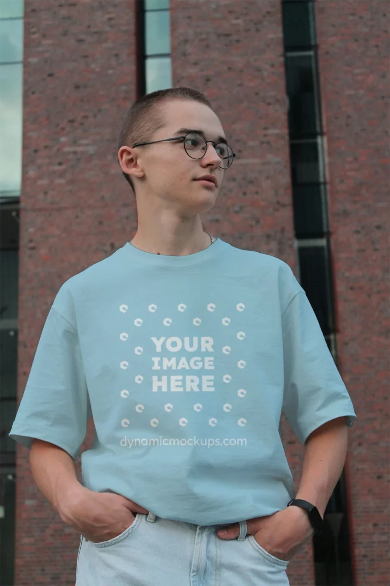 Man Wearing Light Blue T-shirt Mockup Front View Template