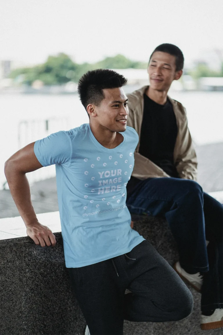 Man Wearing Light Blue T-shirt Mockup Front View Template