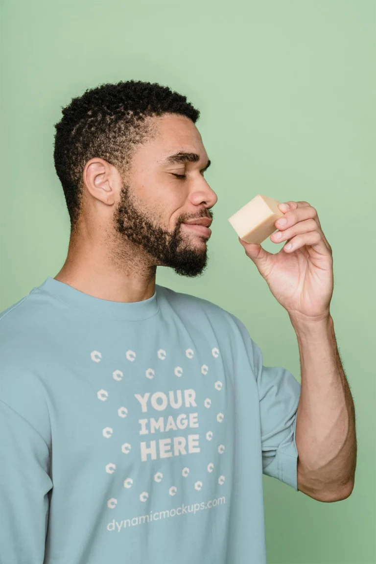 Man Wearing Light Blue T-shirt Mockup Front View Template
