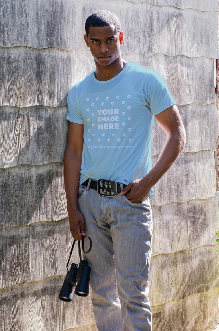 Man Wearing Light Blue T-shirt Mockup Front View Template