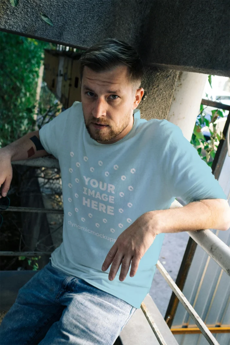 Man Wearing Light Blue T-shirt Mockup Front View Template
