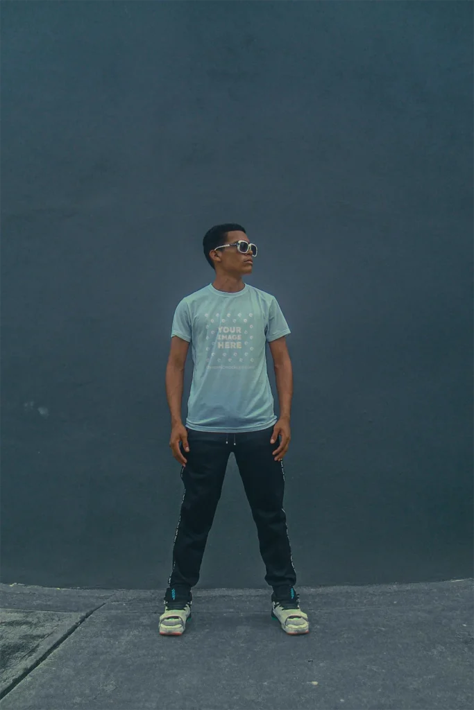 Man Wearing Light Blue T-shirt Mockup Front View Template