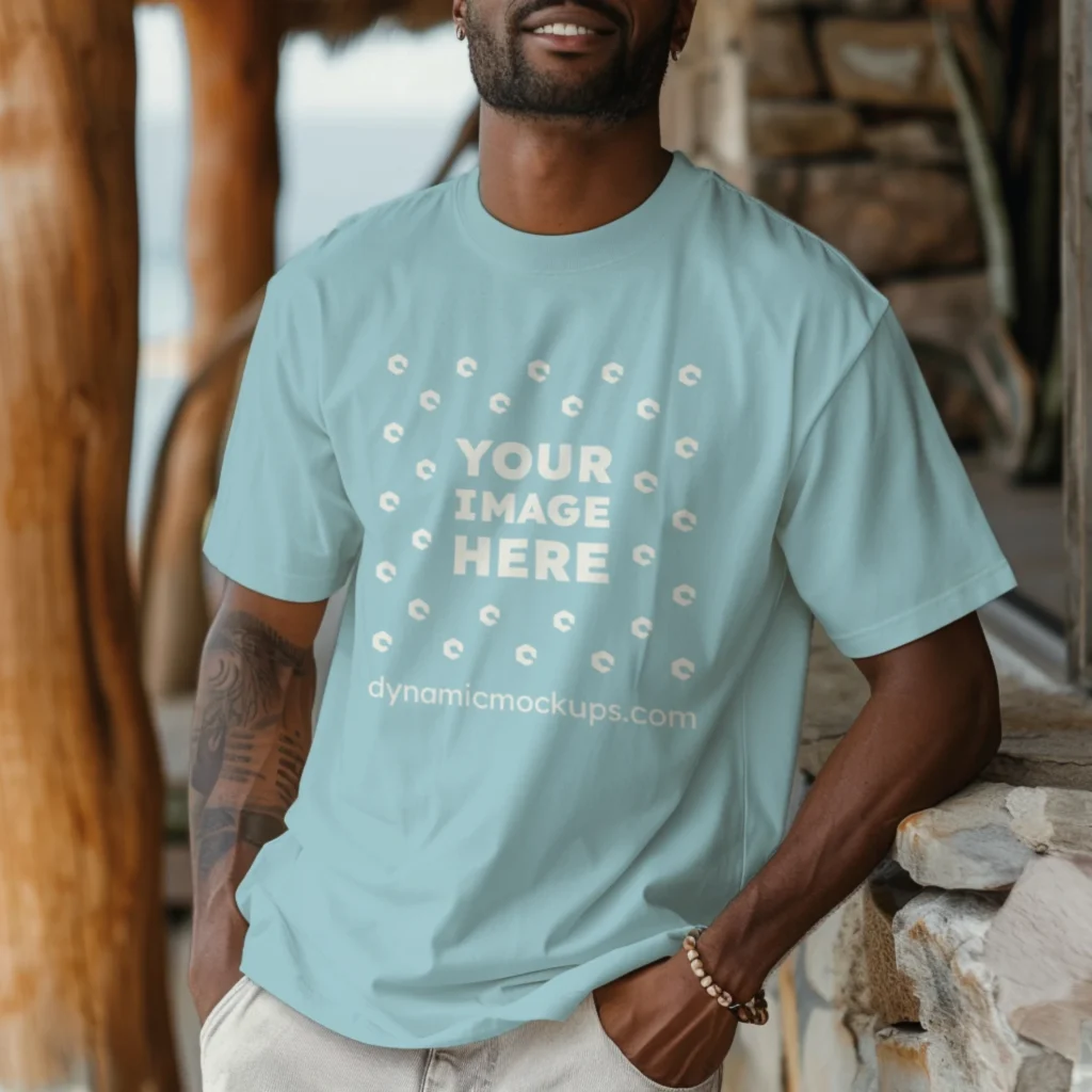 Man Wearing Light Blue T-shirt Mockup Front View Template
