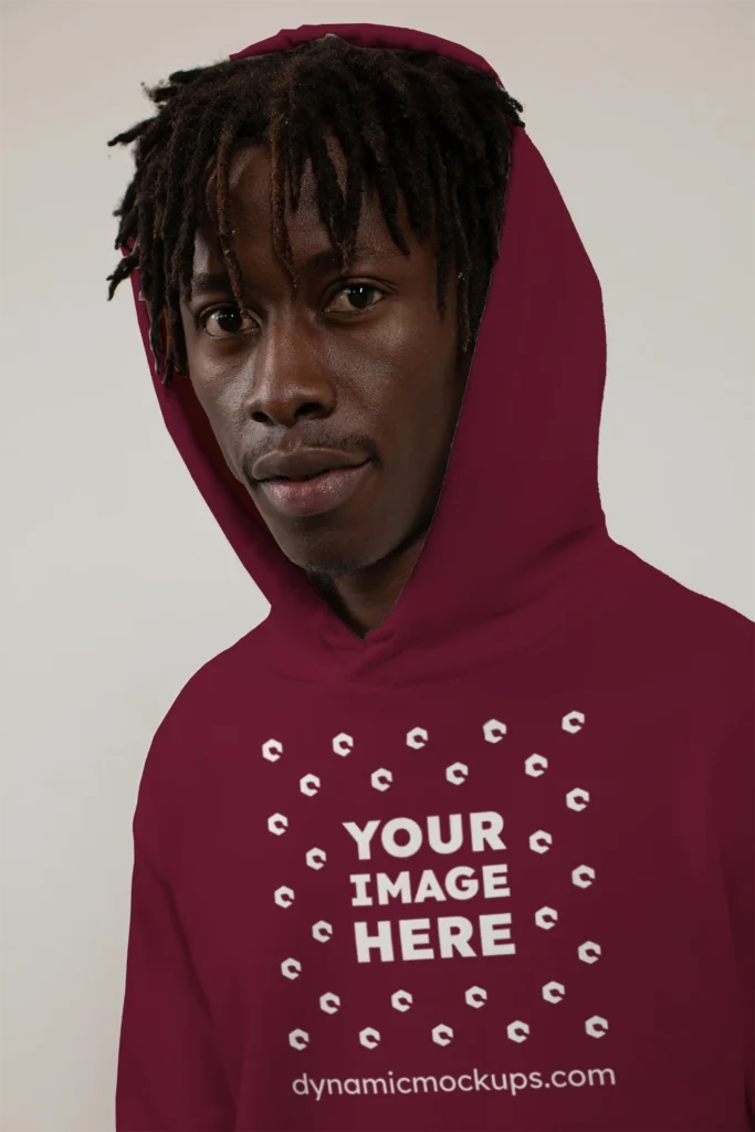 Man Wearing Maroon Hoodie Mockup Front View Template