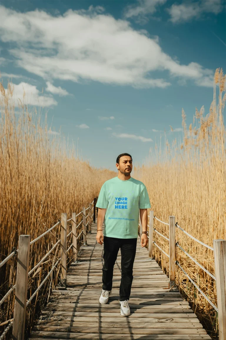 Man Wearing Mint T-shirt Mockup Front View Template