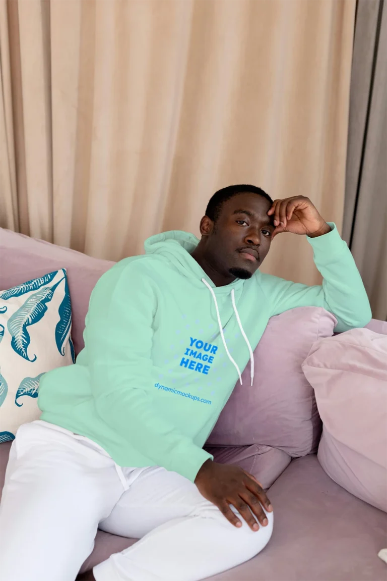 Man Wearing Mint Hoodie Mockup Front View Template