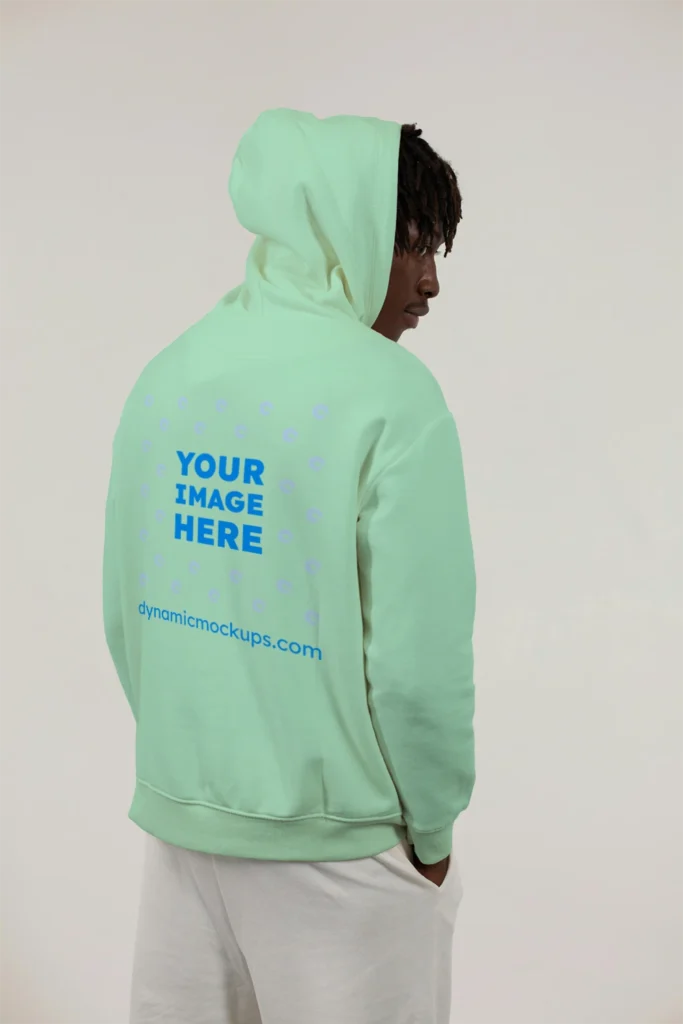 Man Wearing Mint Hoodie Mockup Back View Template