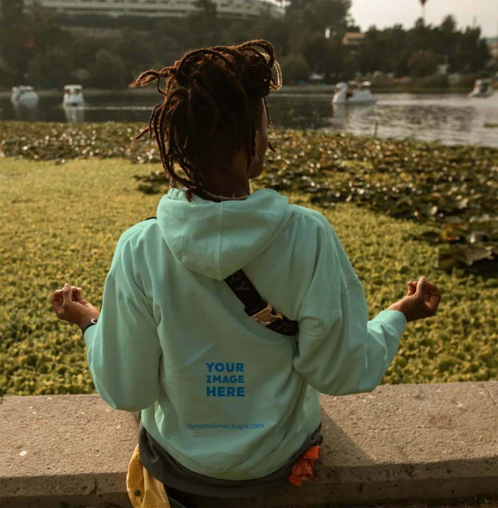Man Wearing Mint Hoodie Mockup Back View Template