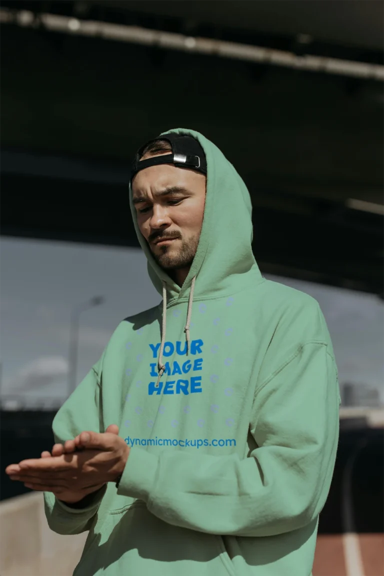 Man Wearing Mint Hoodie Mockup Front View Template