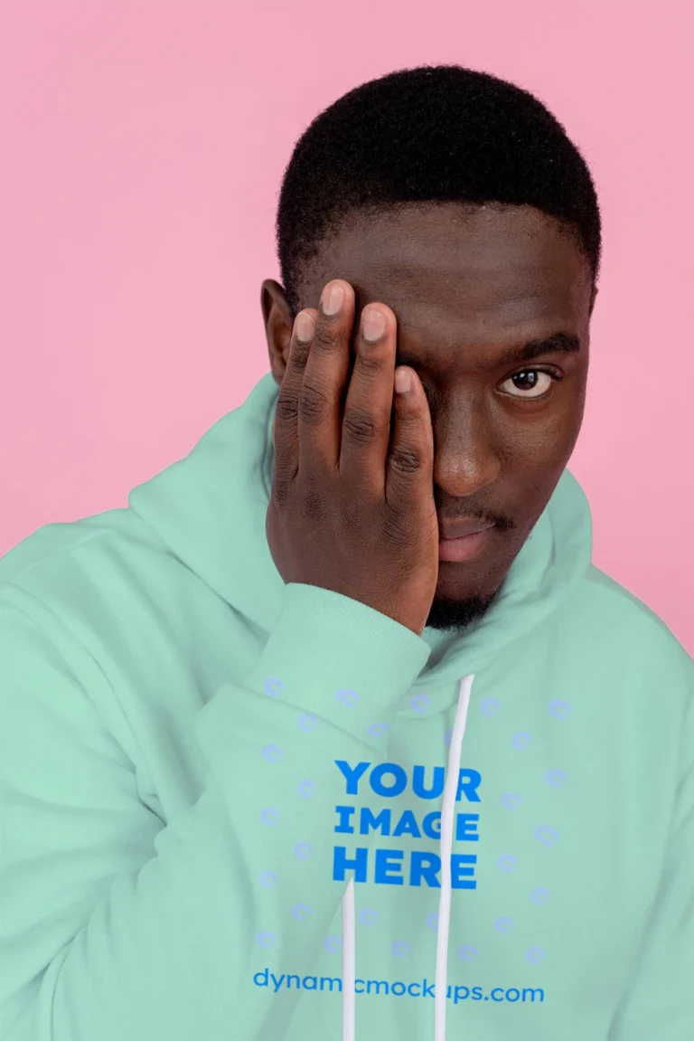 Man Wearing Mint Hoodie Mockup Front View Template