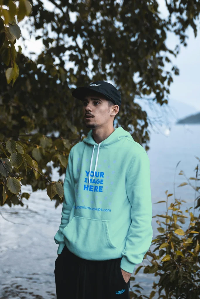 Man Wearing Mint Hoodie Mockup Front View Template