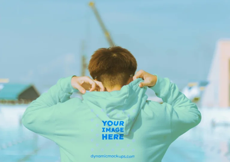 Man Wearing Mint Hoodie Mockup Back View Template