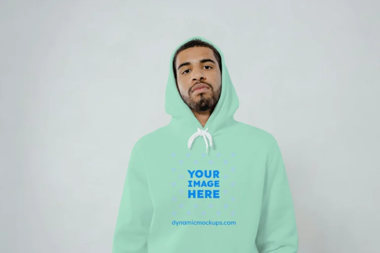 Man Wearing Mint Hoodie Mockup Front View Template