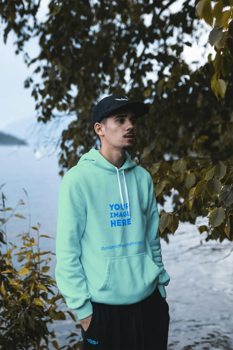Man Wearing Mint Hoodie Mockup Front View Template