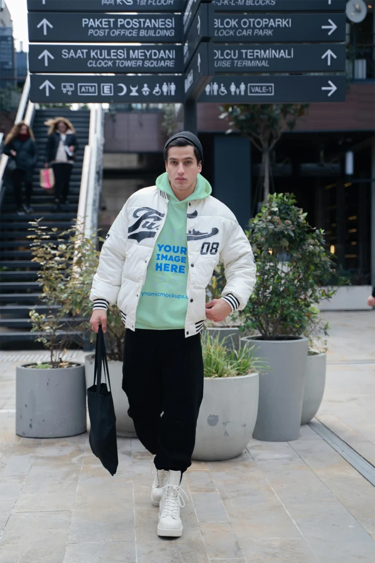 Man Wearing Mint Hoodie Mockup Front View Template