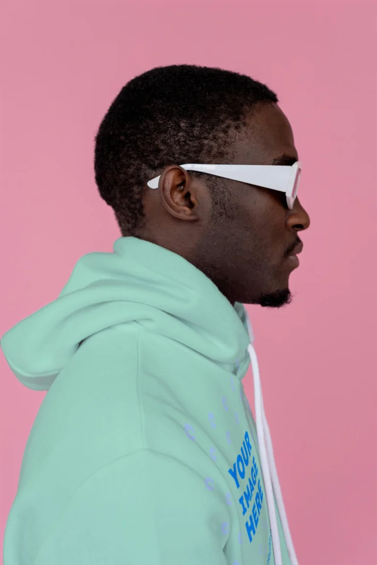 Man Wearing Mint Hoodie Mockup Side View Template