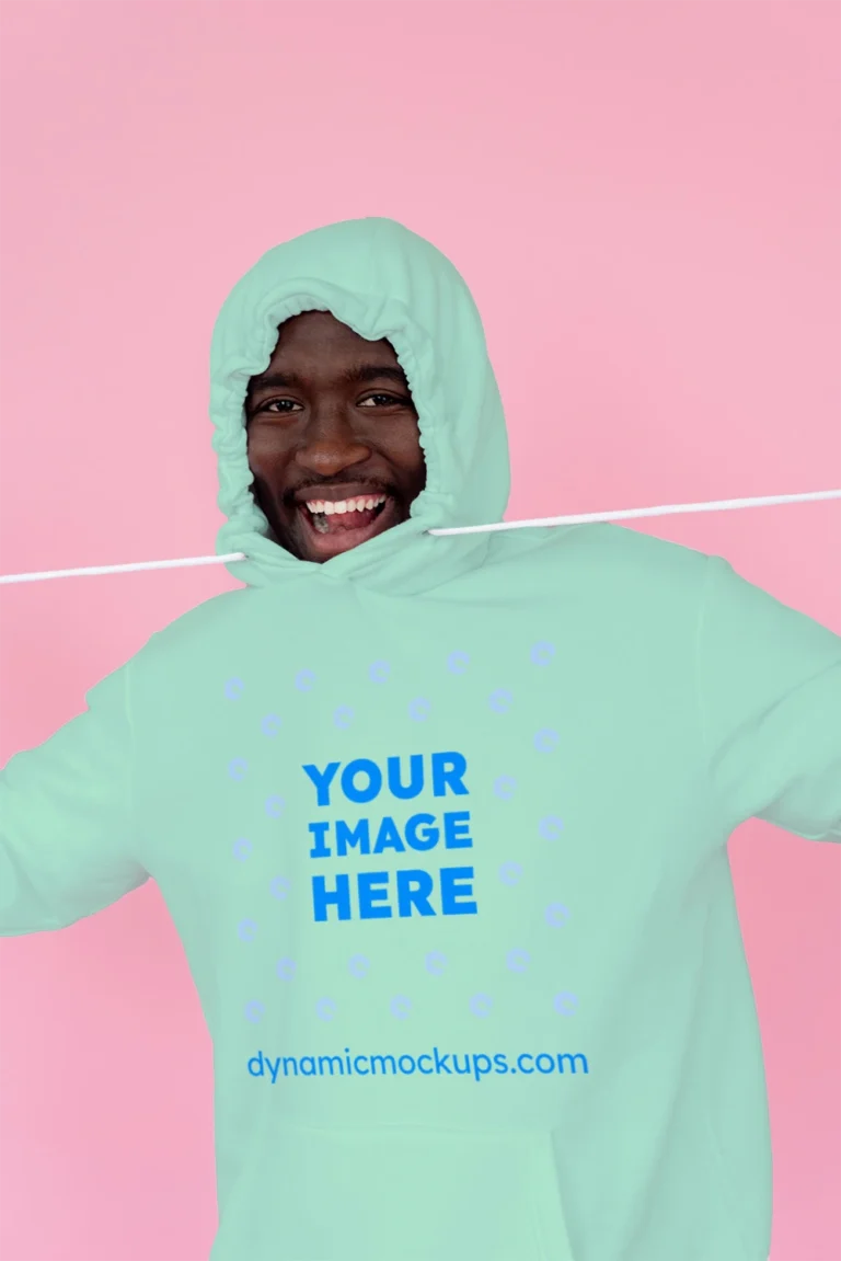Man Wearing Mint Hoodie Mockup Front View Template