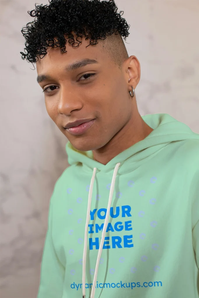 Man Wearing Mint Hoodie Mockup Front View Template