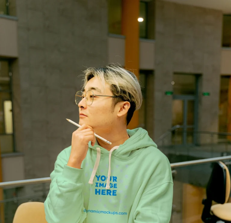 Man Wearing Mint Hoodie Mockup Front View Template