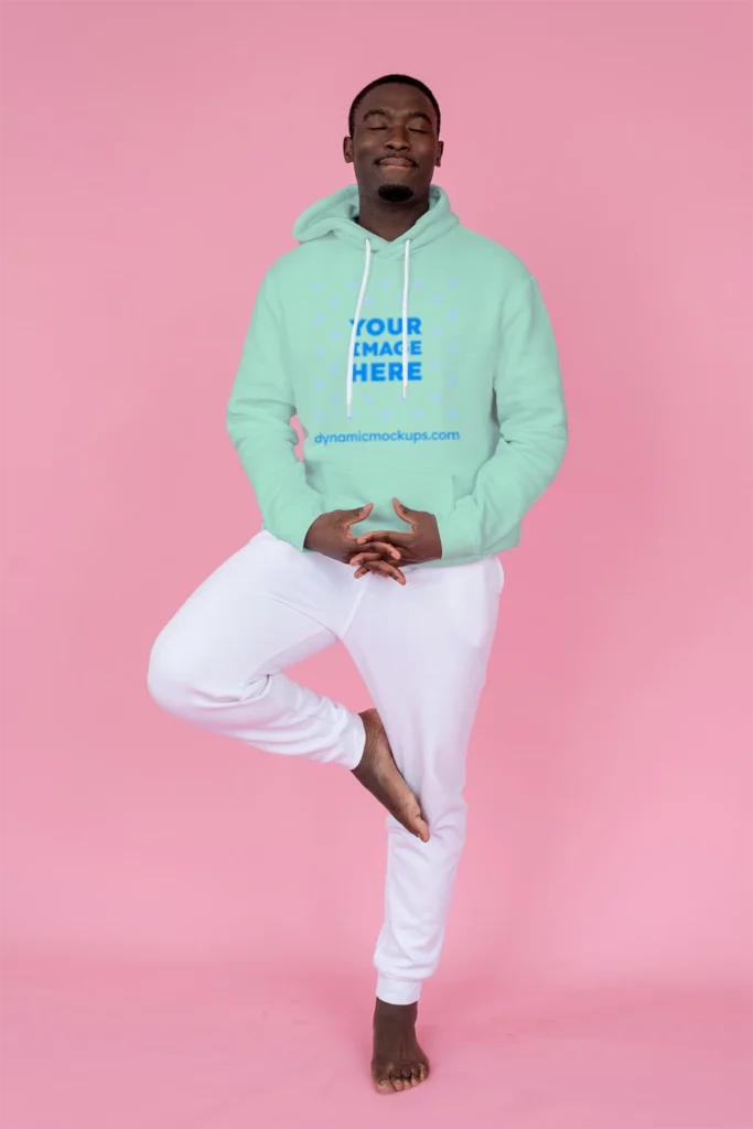 Man Wearing Mint Hoodie Mockup Front View Template